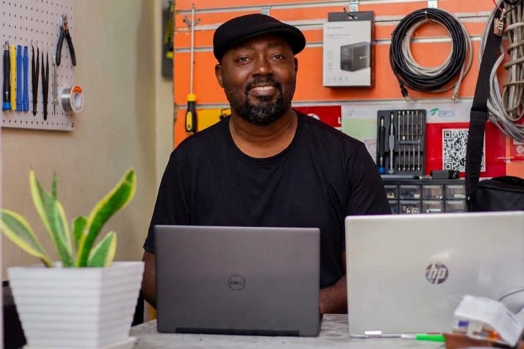 Furaha Mwambenja, founder of Ngomasere Enterprises, at the repair bench